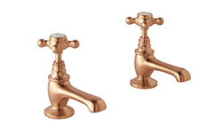 Brushed copper basin taps
