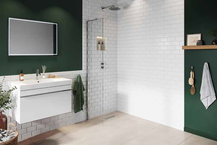 white tiled wetroom with glass screen and chrome fittings