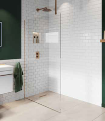 white tiled wetroom with glass screen and bronze fittings