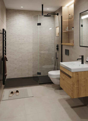 shower room with black tray, glasss creen with pivot return and black fittings